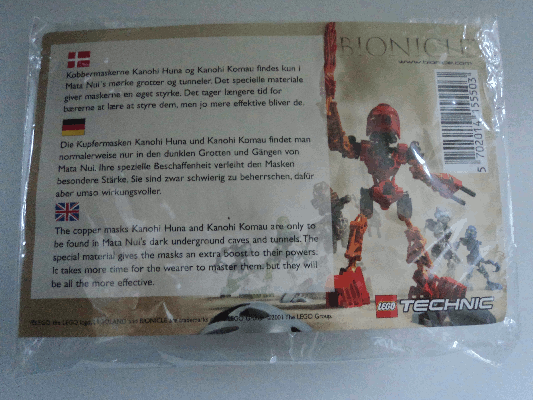 Back of the card in the Special Masks packet. It reads 'The copper masks Kanohi Huna and Kanohi Komau are only to be found in Mata Nui's dark underground caves and tunnels. The special material gives the masks an extra boost to their powers. It takes more time for the wearer to master them, but they will be all the more effective.